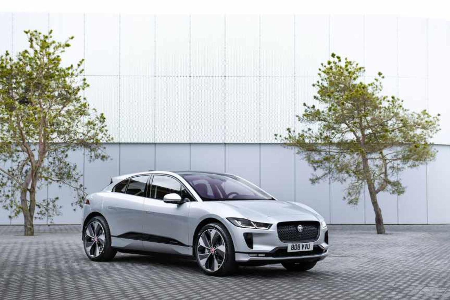 Jaguar I-Pace electric car exterior front parked outside building